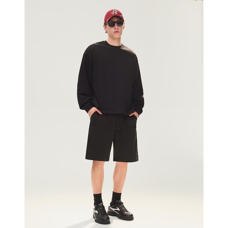 Bershka Basic fleece bermuda shorts in black