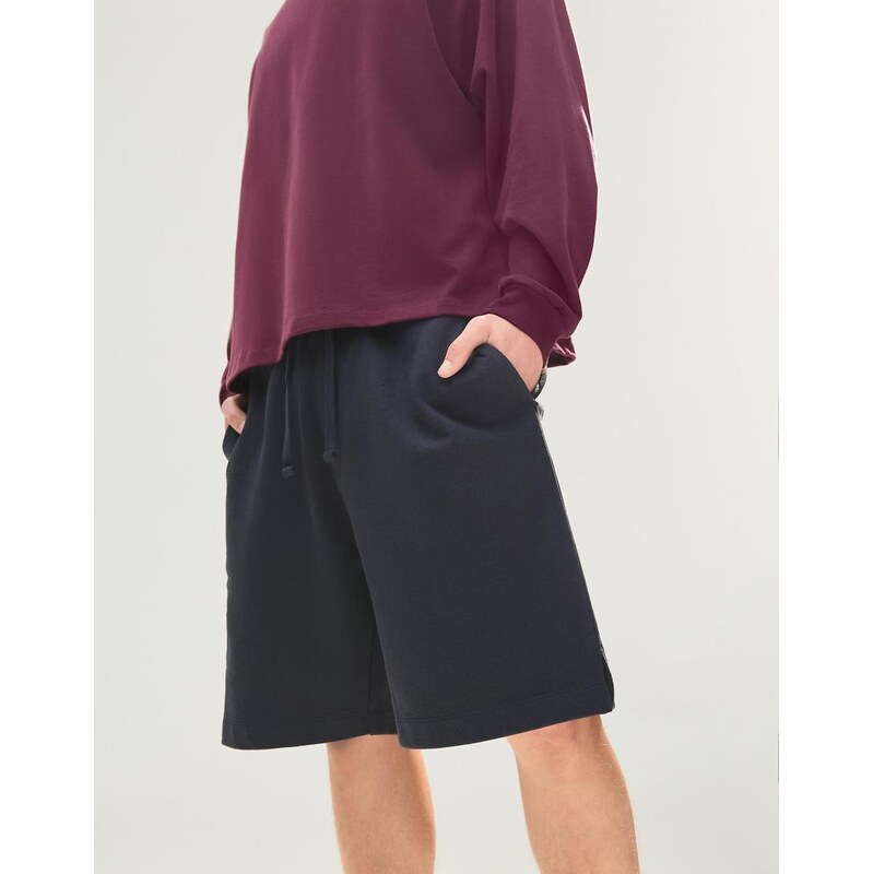 Bershka Basic fleece bermuda shorts in blue-Navy