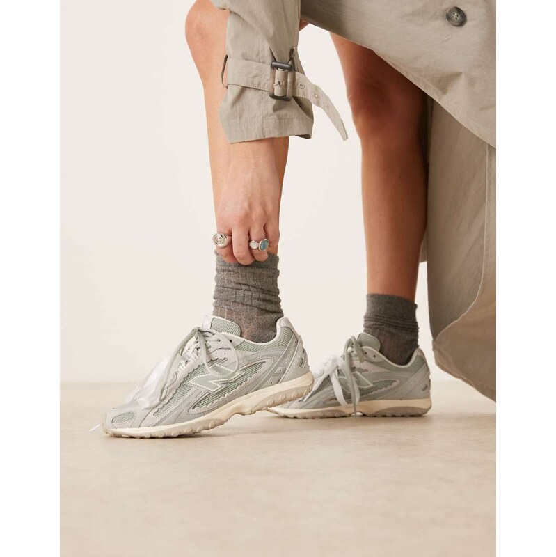New Balance 204L scallop trainers in grey and sage green