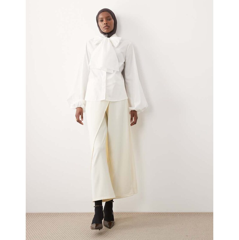 IYAL trouser with wrap over skirt button detail in cream-White