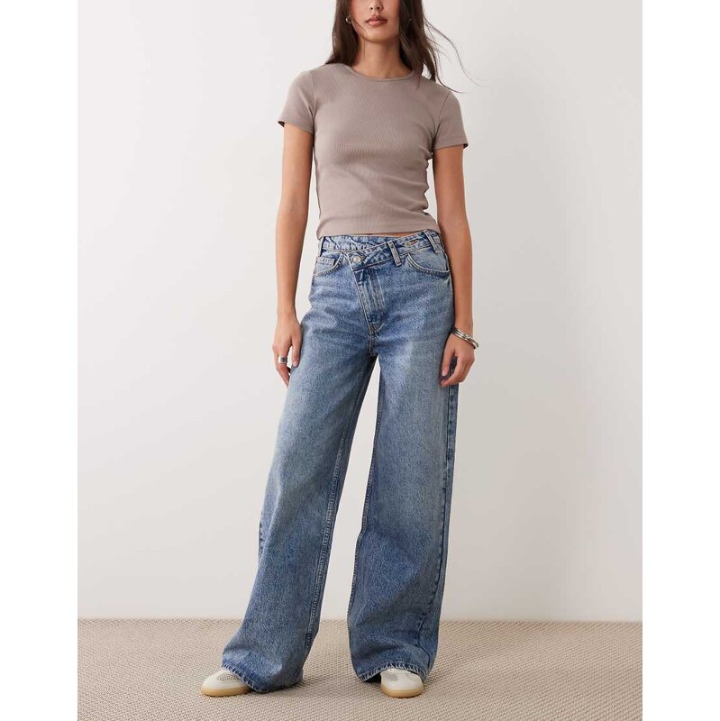 ASOS DESIGN wide leg dad jean with crossover waist in midwash