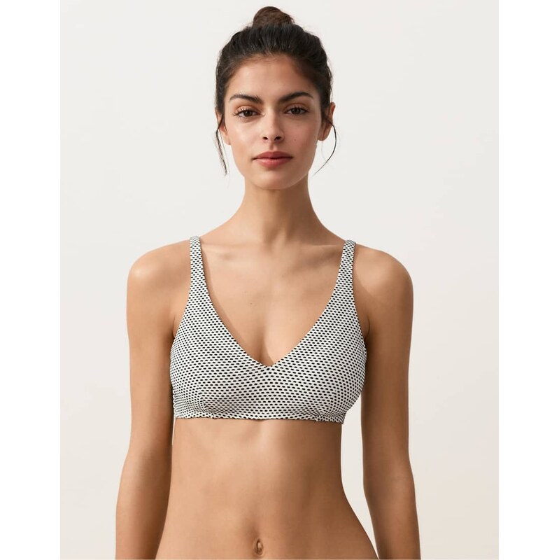 OYSHO Jacquard polka dot halter bikini top in white and black 114157381