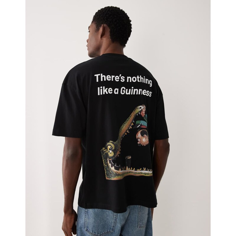 ASOS DESIGN oversized t-shirt with Guinness print in black