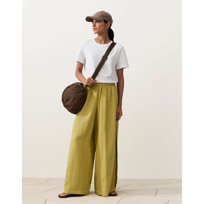 OYSHO 100% linen wide-leg trousers with side pleat in lime green 114183731