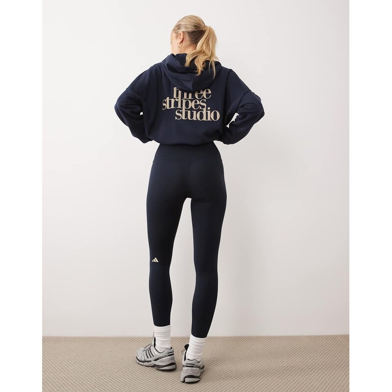 adidas Performance Three Stripes Studios crossover waistband leggings in navy and cream