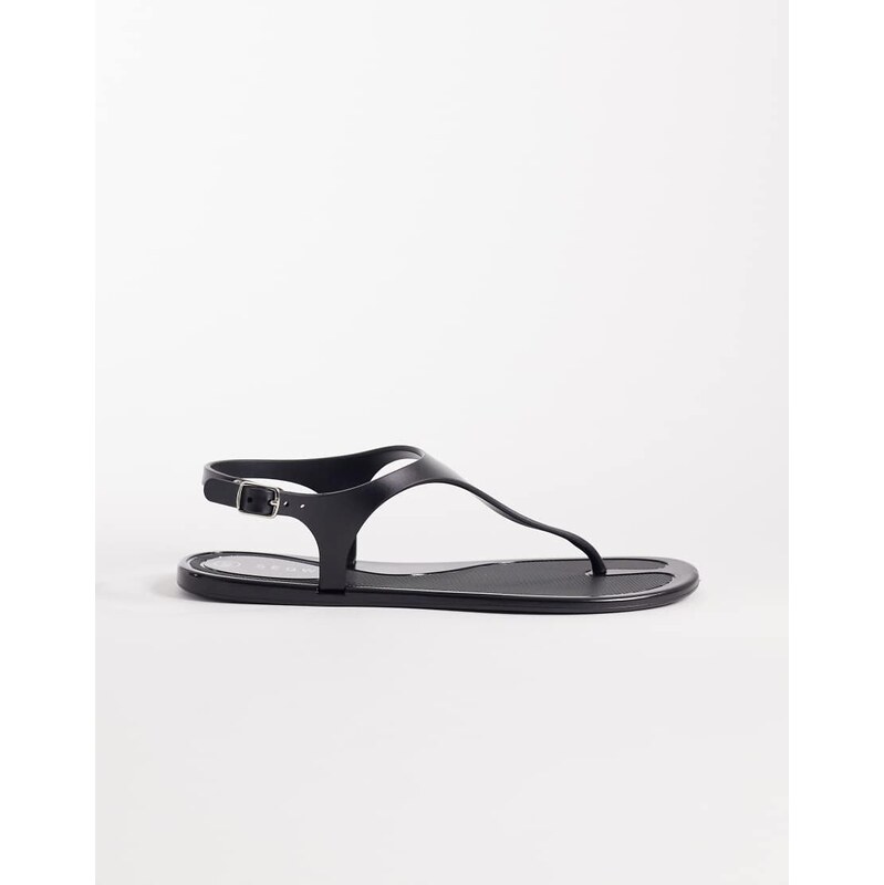 SEQWL jelly thong sandals with buckle detail in black 114343086