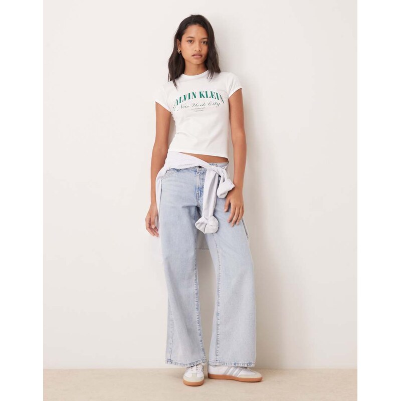 Calvin Klein Jeans heritage logo baby tee with emerald script writing in white - WHITE