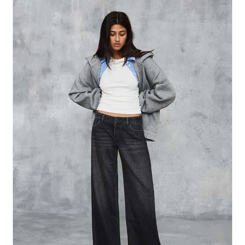 Bershka Petite low-rise wide-leg jeans in black