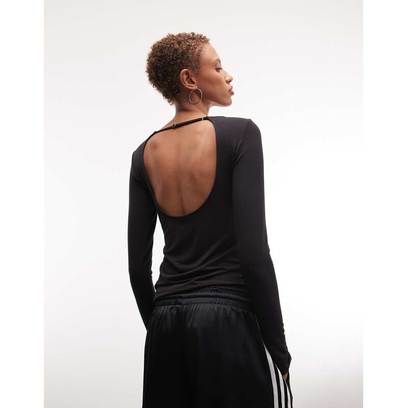 Weekday open back long sleeve top in black 114385273