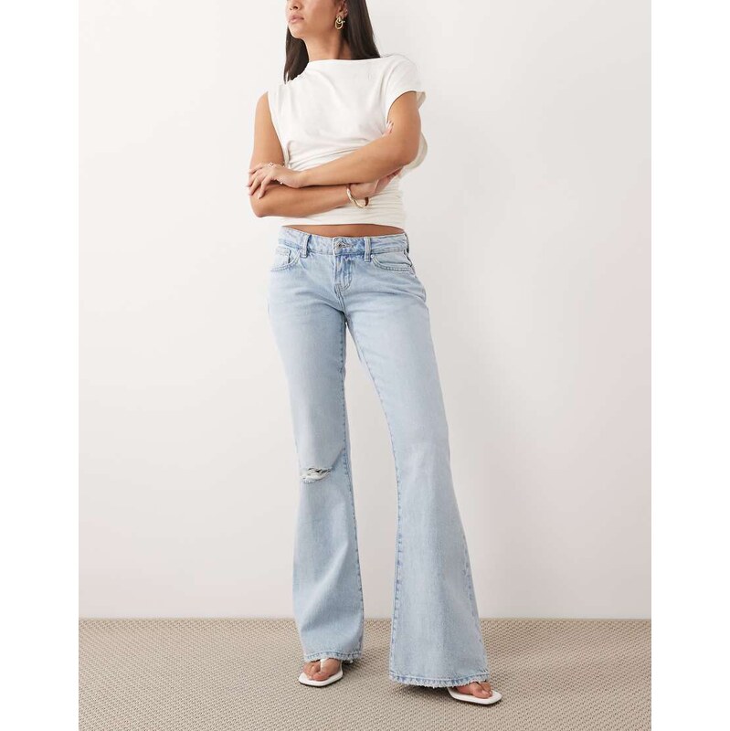 Gina Tricot low waist flare ripped jeans in lightwash blue