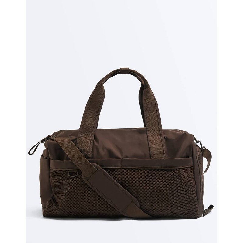 OYSHO Technical bag with double compartment in brown 114403970
