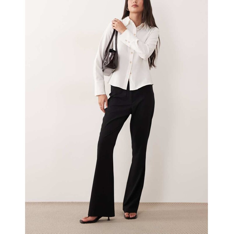ASOS DESIGN mid rise tailored bootcut flared trouser in black