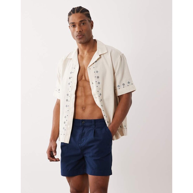 ASOS DESIGN shorter length short in navy with pleat