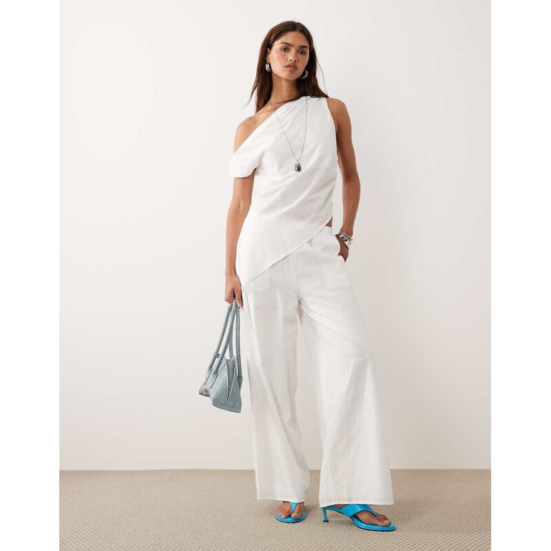 Bronze Snake Tasi off shoulder asymetric top and trouser set in white 114423511