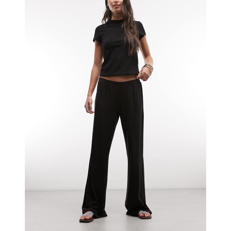 Weekday slouchy jersey trousers in black 115167030