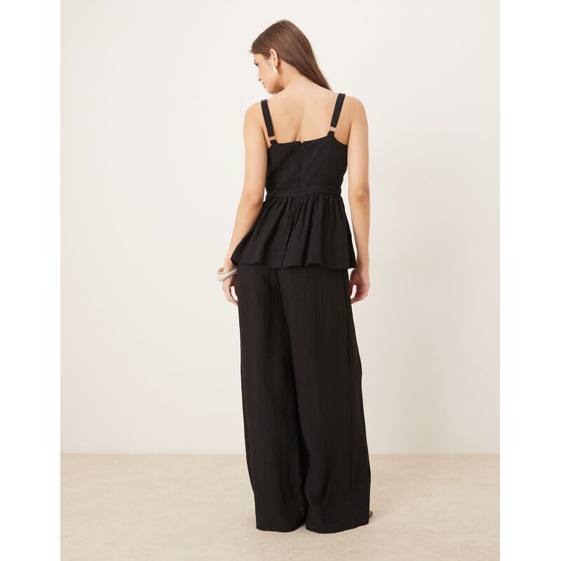 ASOS DESIGN jumpsuit with peplum waist in black