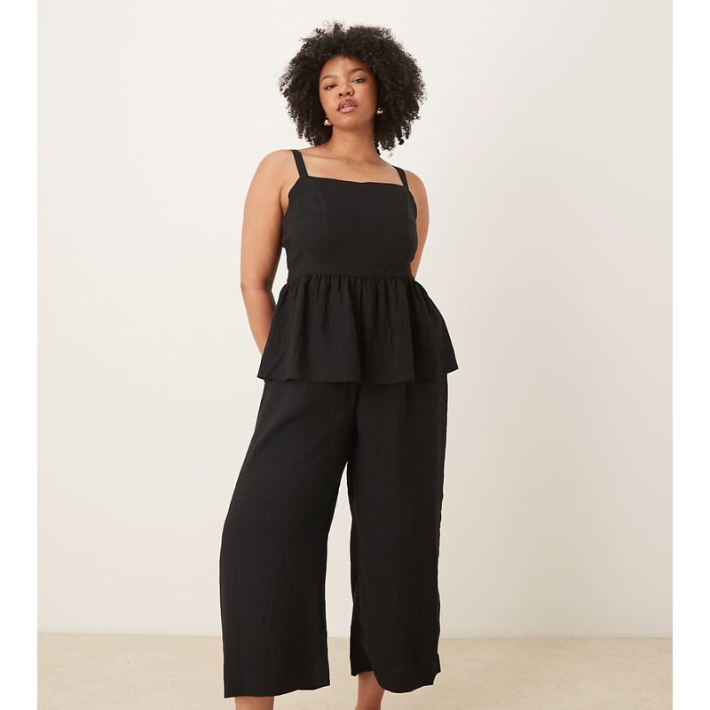 ASOS Curve ASOS DESIGN Curve jumpsuit with peplum waist in black 115520442