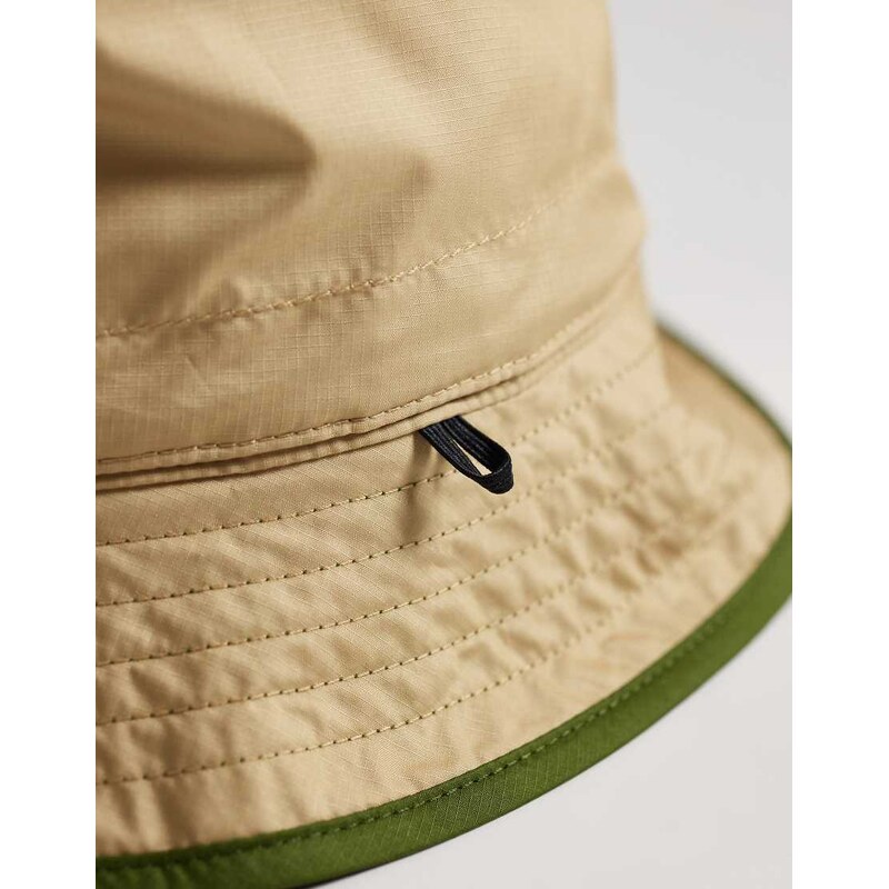 The North Face Sun Stash reversible hat in green