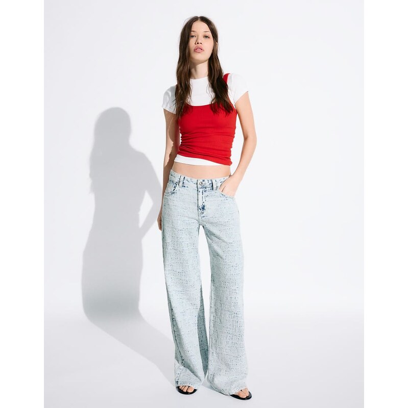 Bershka Low-rise textured jacquard boyfriend jeans in mid blue