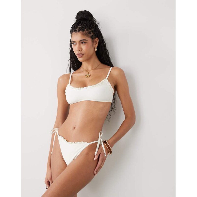 Reclaimed Vintage tie side bikini bottom with frill in cream