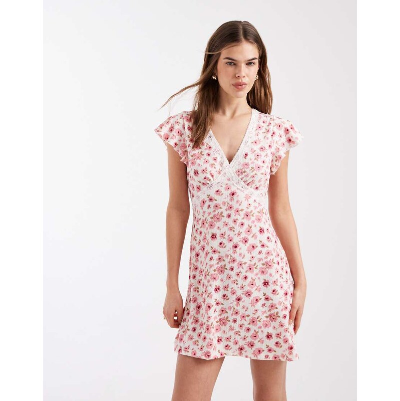 New Look lace trim flutter sleeve mini dress in pink ditsy