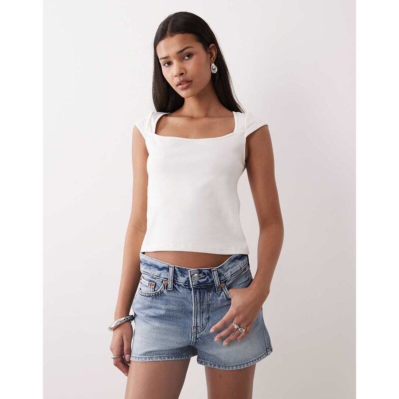 Calvin Klein Jeans archive mini denim short in mid wash blue 114540948