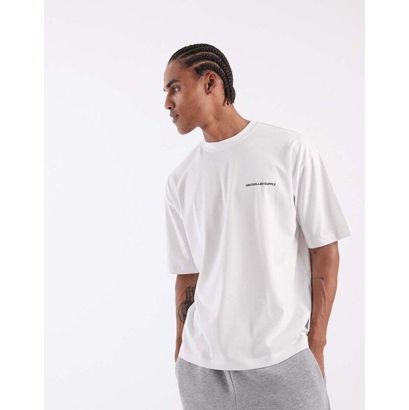 ASOS DESIGN oversized t-shirt with unrvlld text graphic in white