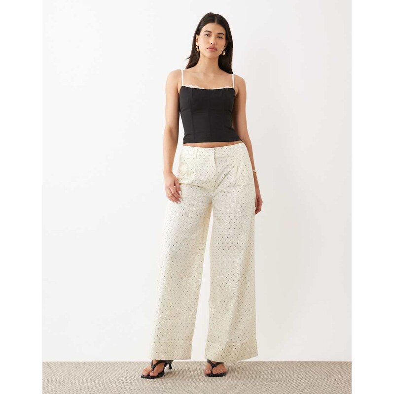 ASOS DESIGN wide leg polka dot trousers with turn up hem in