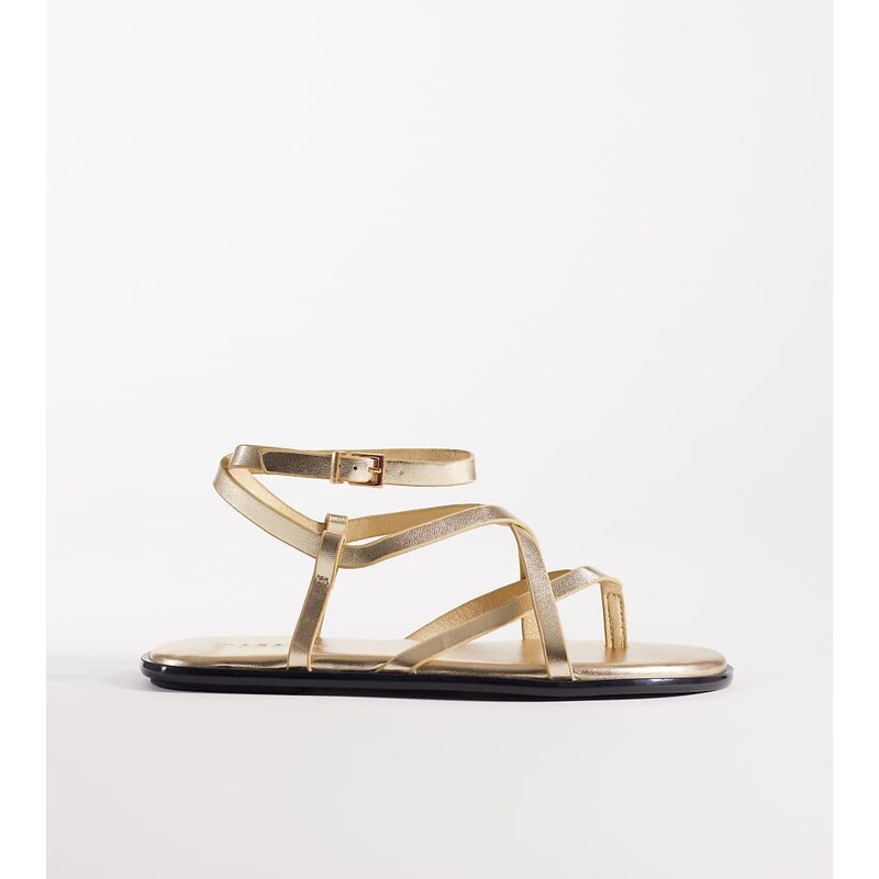 SEQWL Wide Fit strappy flat sandals with buckle detail in gold