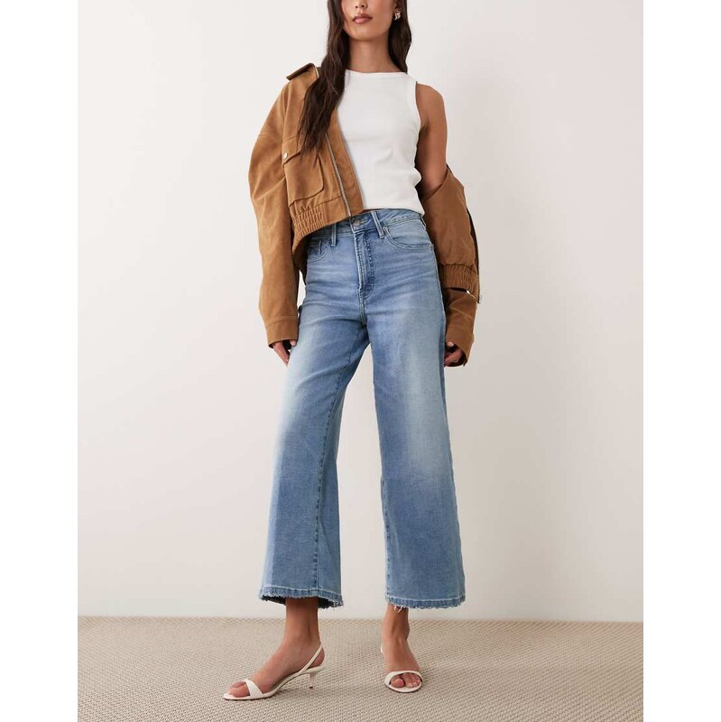 Good American good waist soft tech palazzo cropped jeans in