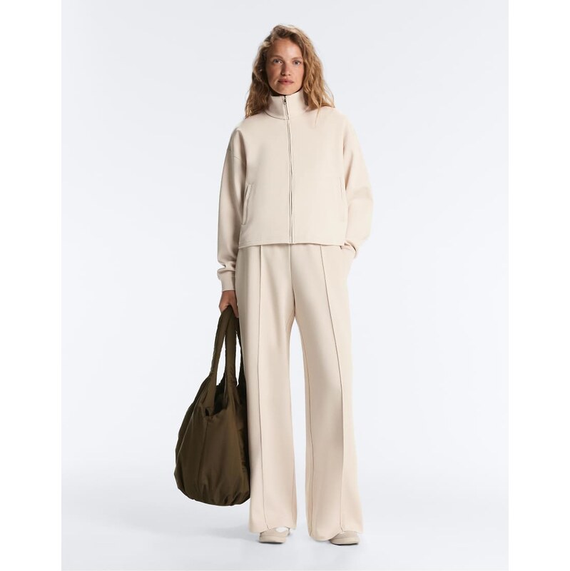 OYSHO Cotton piqué straight-leg trousers with crease in light beige 114544060