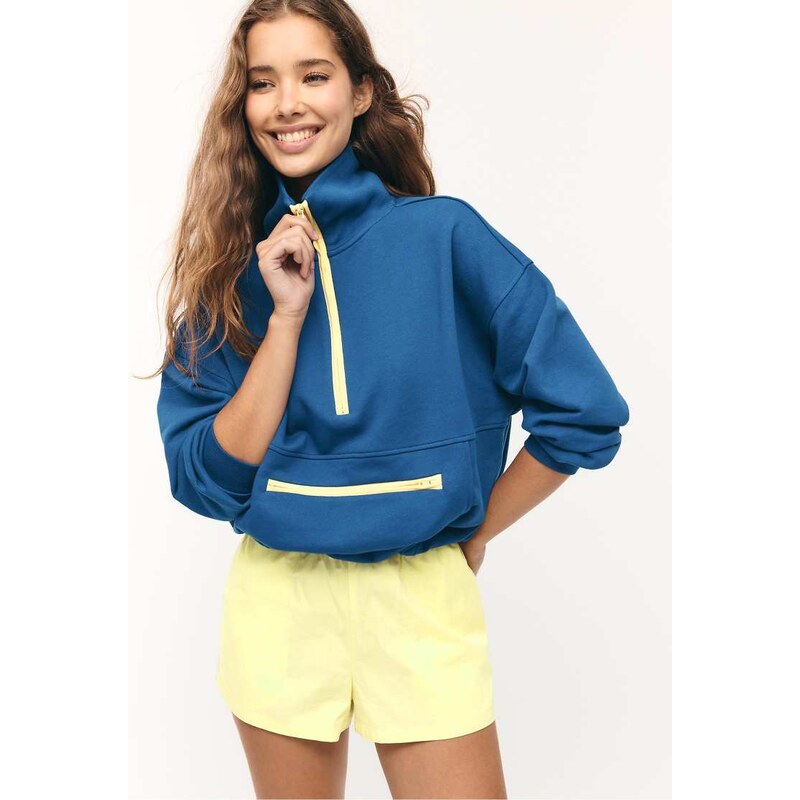 Stradivarius Technical shorts with side stripe in pastel yellow