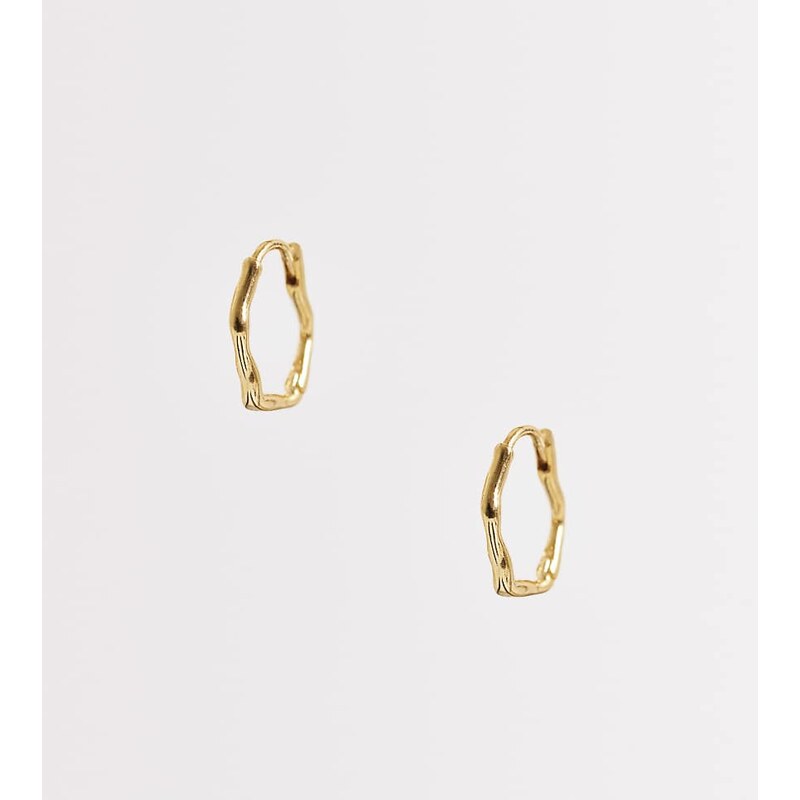 Orelia oval wave huggie hoops in 18k gold plated 114789856