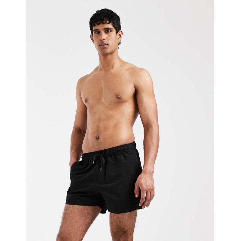ASOS DESIGN swim shorts in short length in black