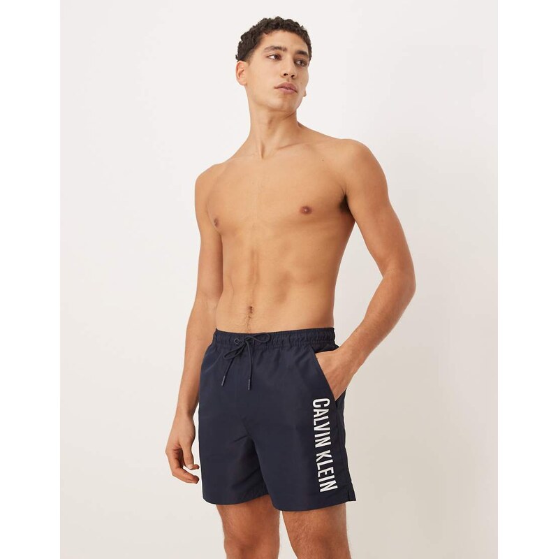Calvin Klein contrast side script swim trunks in dark navy