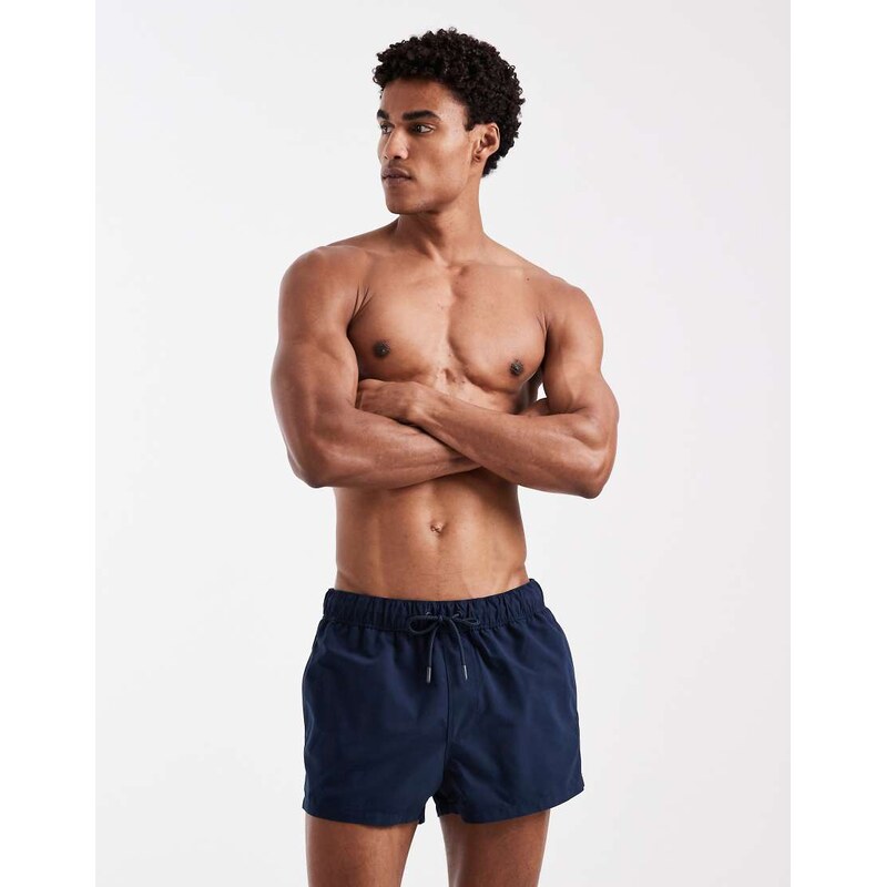 ASOS DESIGN swim shorts in super short length in navy