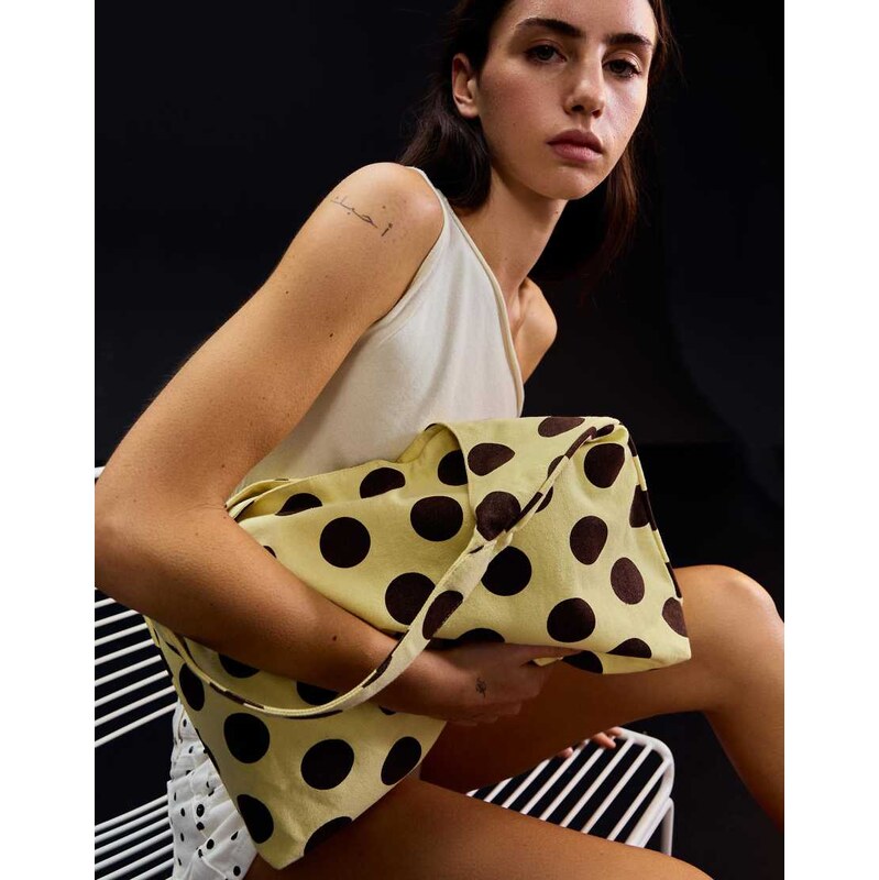 Bershka Polka dot bucket bag in yellow 114584714