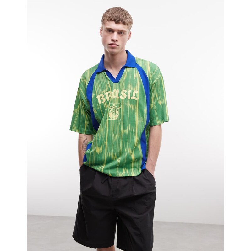ASOS DESIGN boxy oversized polo with all over print and Brazil