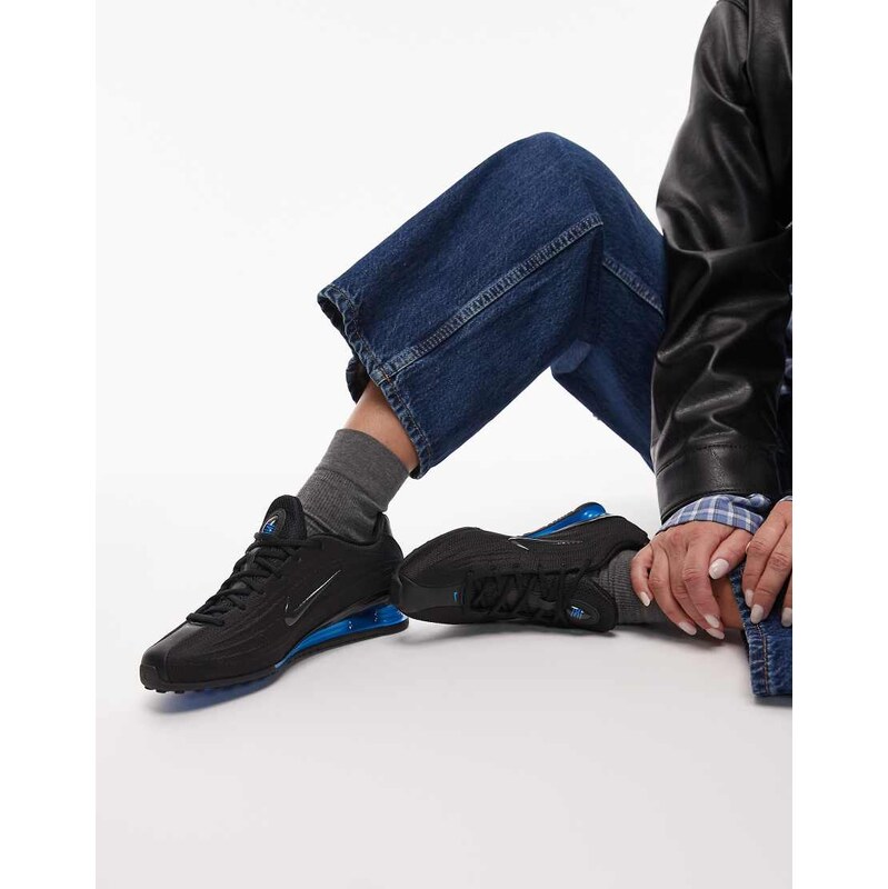 Nike Shox Z trainers in black and dark blue