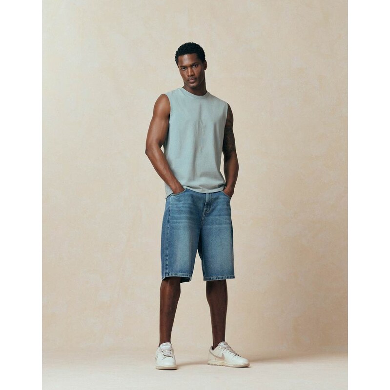 ASOS DESIGN loose denim jorts in mid washed blue