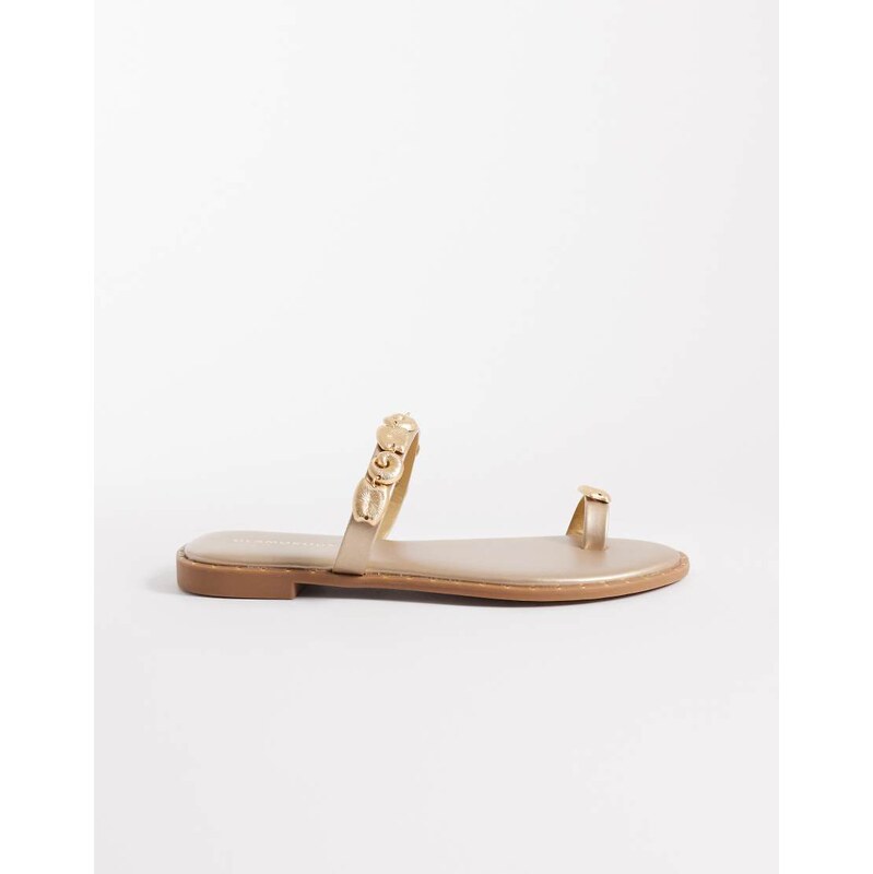 Glamorous flat sandals with gold shells in gold 114807720