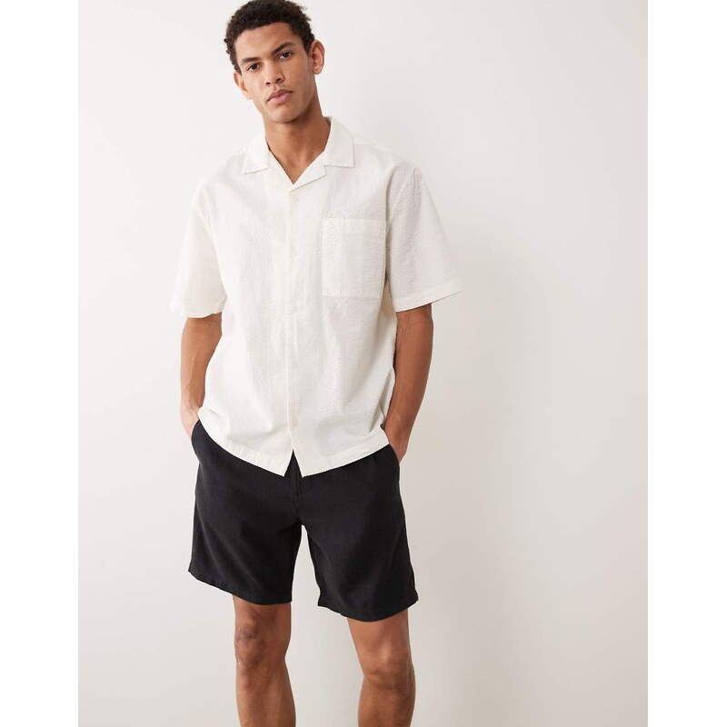 ASOS DESIGN slim linen blend shorts in mid length in black