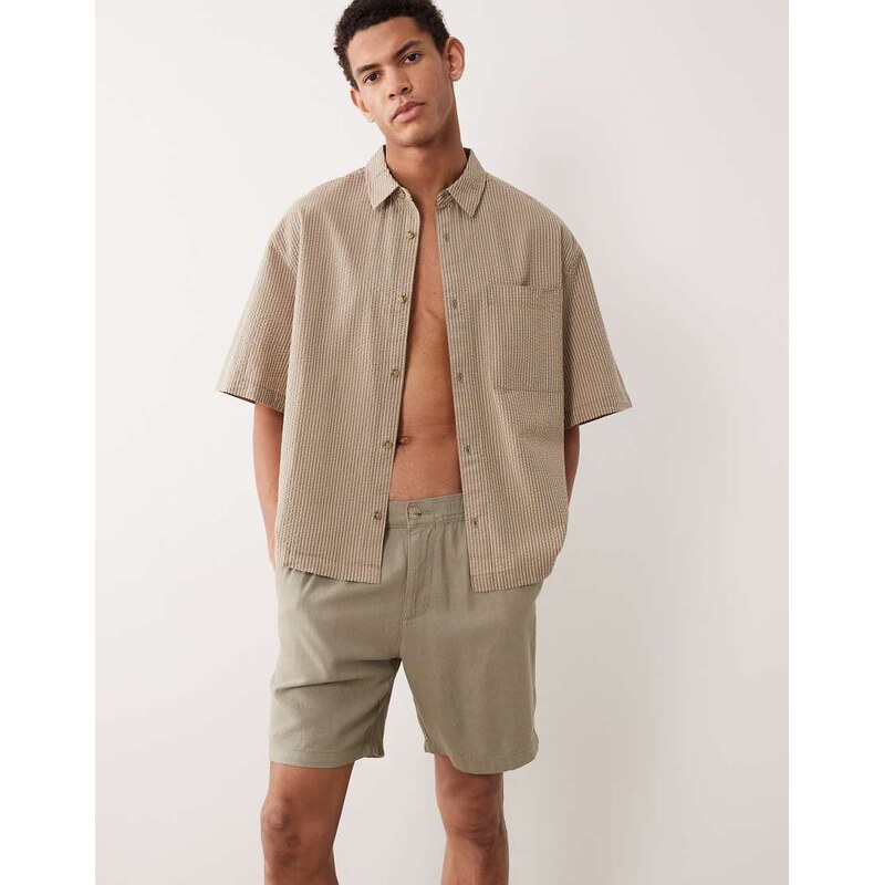 ASOS DESIGN slim linen blend shorts in mid length in khaki-Green