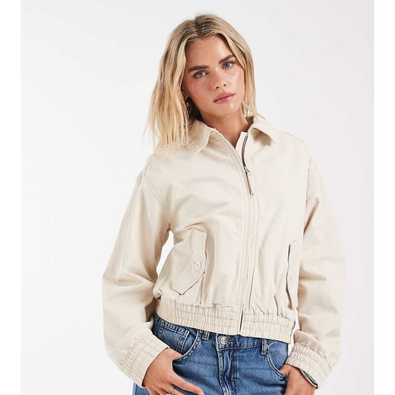 ASOS Petite ASOS DESIGN Petite washed cotton bomber jacket in cream 114708704