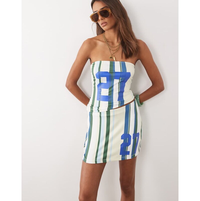 ASOS DESIGN skort with varsity number in soft touch stripe