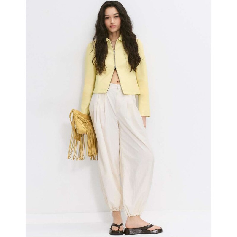 Stradivarius Fitted leather effect jacket in pastel yellow 114699226