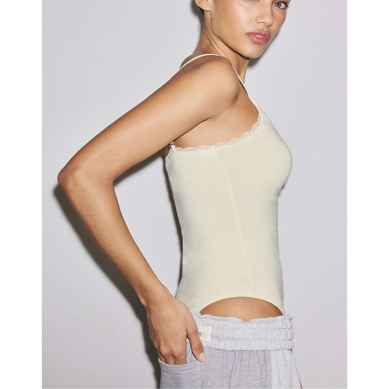 Stradivarius Bodysuit with blonde lace detail in pastel yellow
