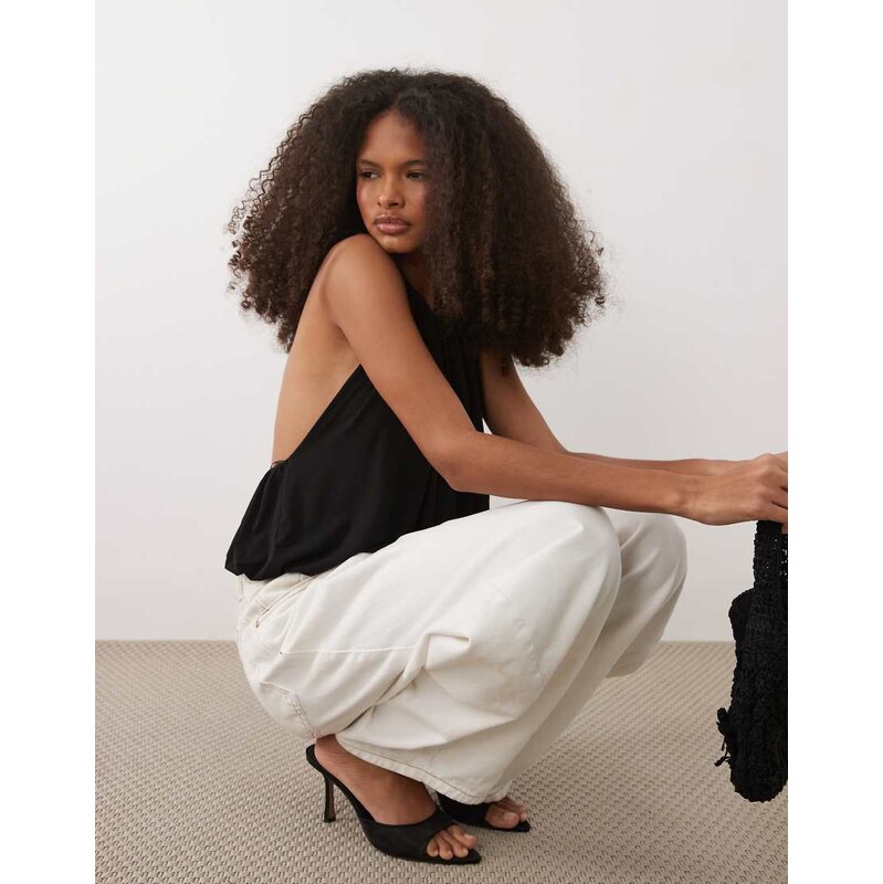 Mango halterneck backless puffball waist bodysuit in black 114720294