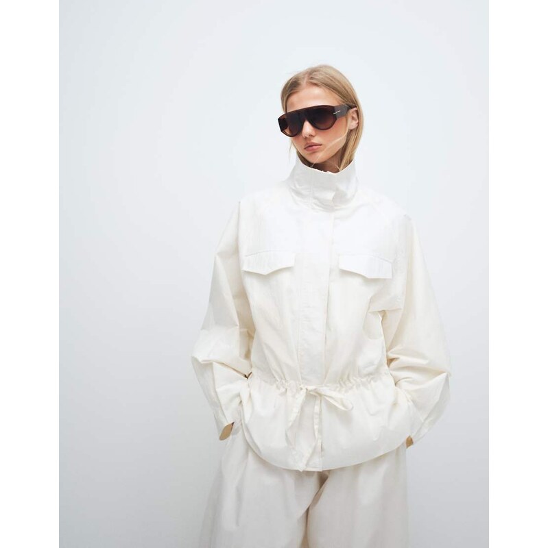 ASOS DESIGN drop waist cinched windbreaker jacket in off white-Neutral 115518671