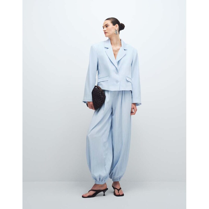 ASOS DESIGN Tailored cuff hem balloon trousers in soft blue